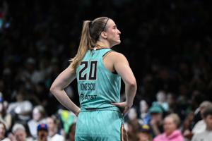 Jun 14, 2026; Brooklyn, New York, USA; New York Liberty guard Sabrina Ionescu (20) checks the scoreboard during the second half against the Washington Mystics at Barclays Center. Mandatory Credit: John Jones-Imagn Images