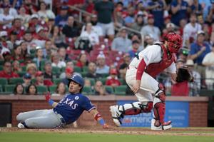St. Louis Cardinals try to get the bats going against the Texas Rangers