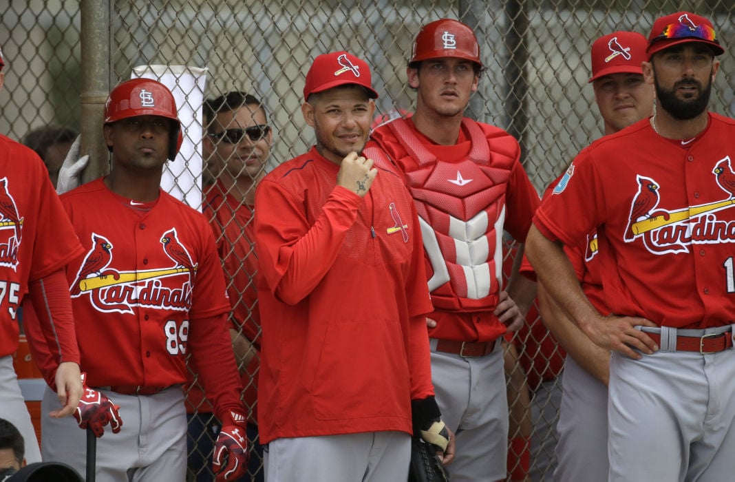 Yadier Molina shattered his bat while attempting to tap home plate