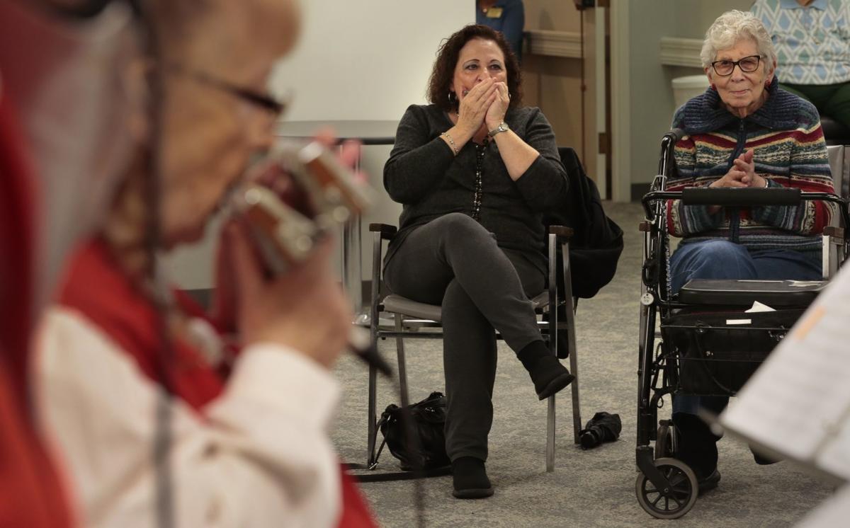 Harmonica club blows goodwill for St. Louis audiences