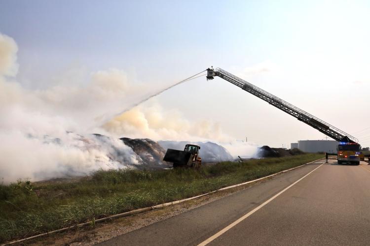 Persistent mulch fire still burning at Sauget lawn and garden store
