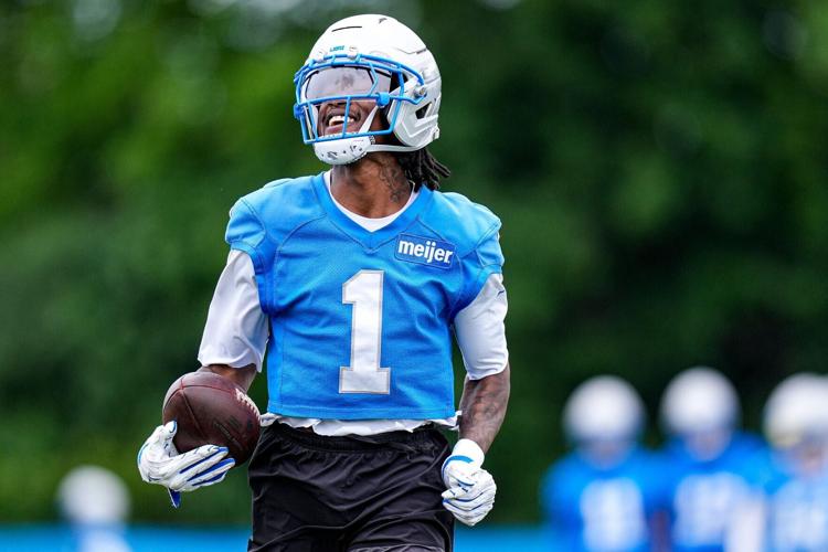 Detroit Lions wide receiver Jameson Williams (1) practices during mini camp at Meijer Performance Center in Allen Park on