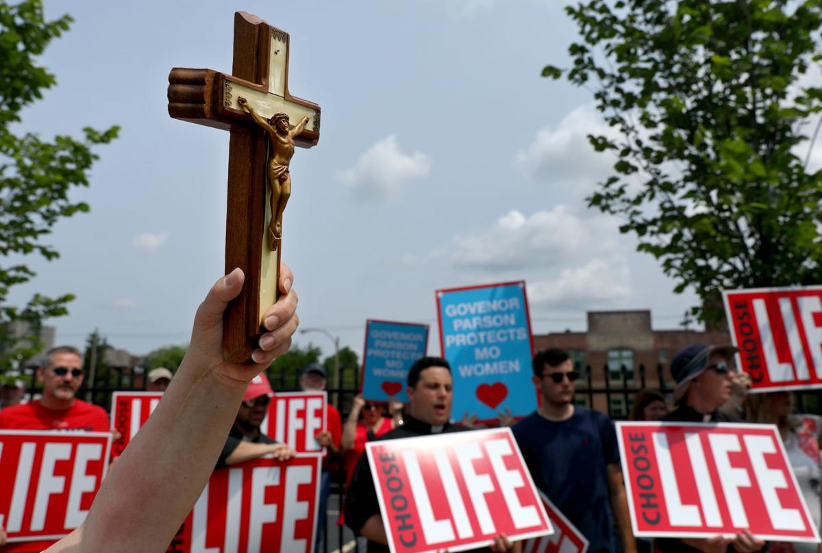 Anti-abortion and abortion rights activists protest in St. Louis