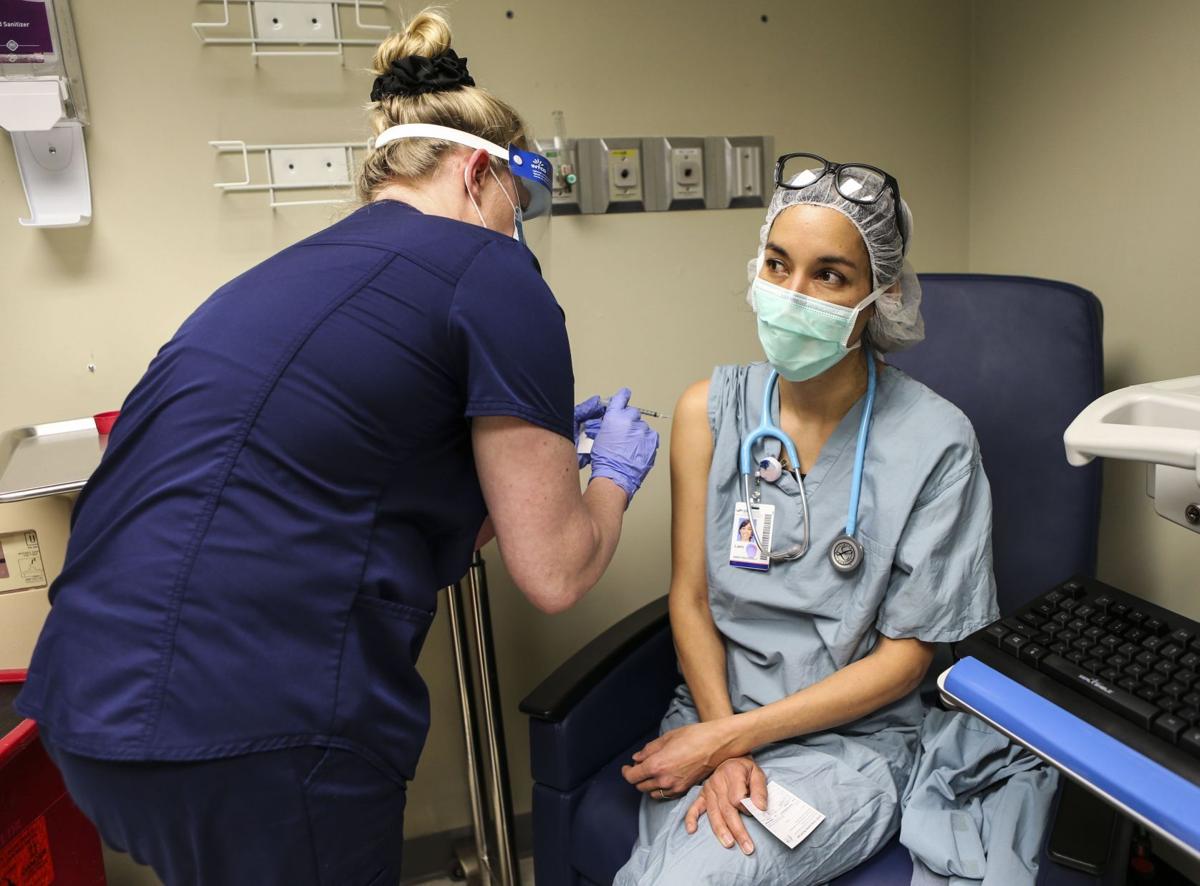 Staff receive COVID-19 vaccinations at SSM Health Saint Louis University Hospital