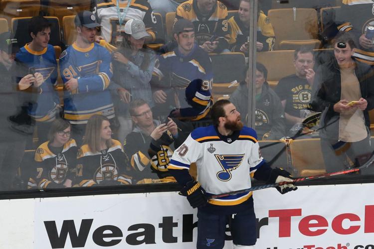 St. Louis Blues players leave the dressing room for warm-ups all