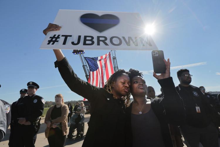 Family, friends, colleagues send-off Ferguson police officer Travis Brown
