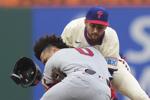 Phillies slip through Cardinals bullpen, just past their defense to halt winning streak at 9