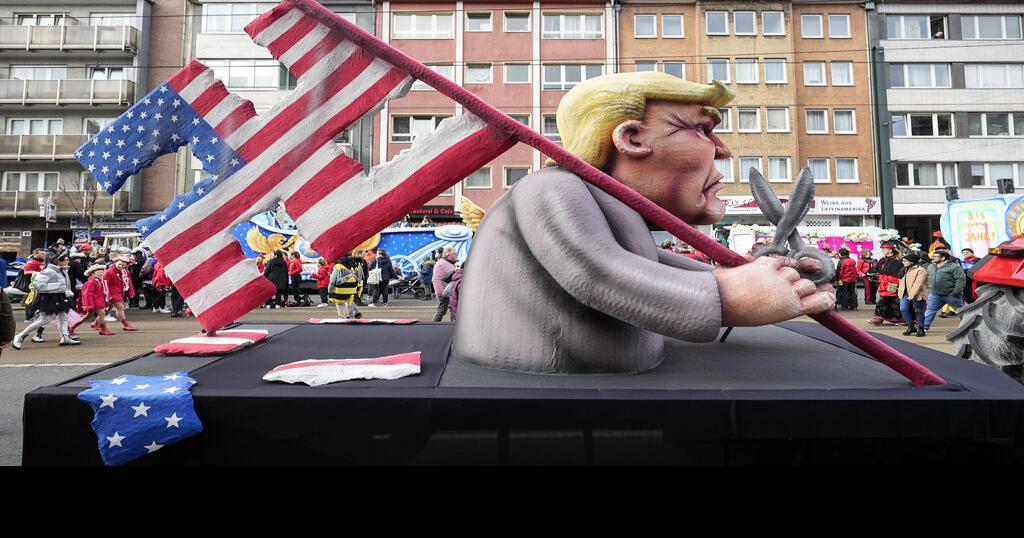Floats at germany s carnival parades satirize leading political figures