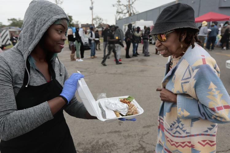 Save-A-Lot parking lot becomes a grassroots community hub for food, clothing and supplies