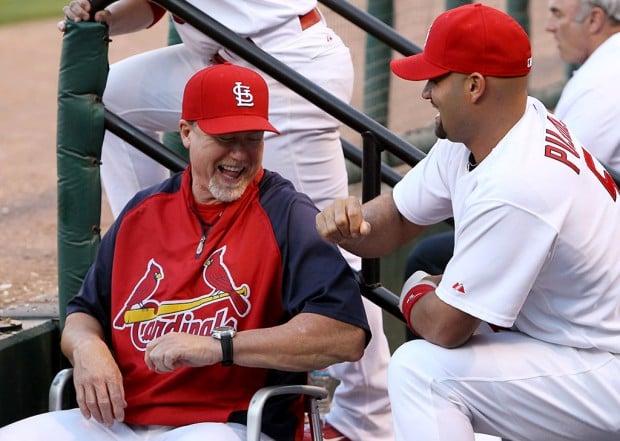 Mark McGwire begins life as the St. Louis Cardinals' hitting coach