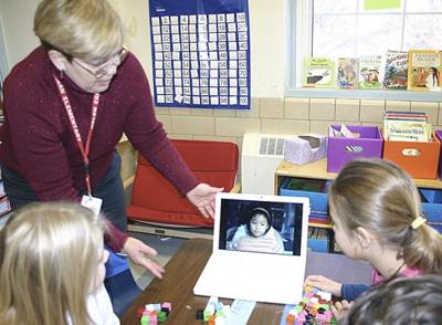 KIRKWOOD SCHOOLS: Tillman students reach friend in Taiwan by computer
