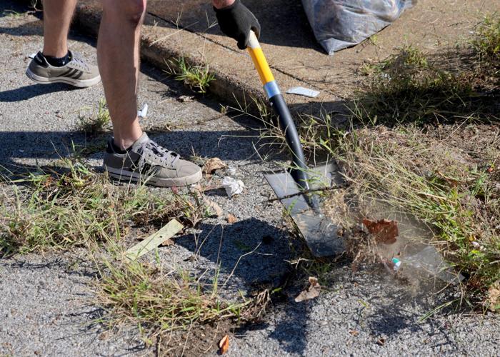 Cyclist advocacy group clears lanes and walkways along Gravois Avenue