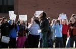 Francis Howell students take to the streets to protest school board actions on race and gender issues