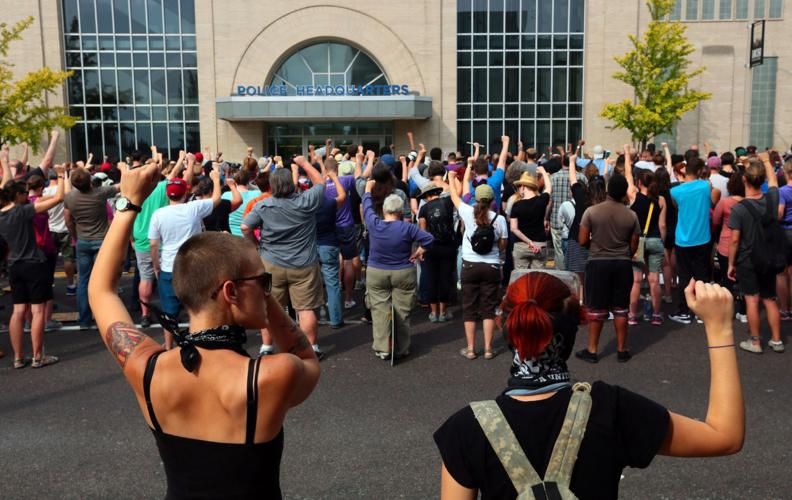 Protests continue downtown, based at police station