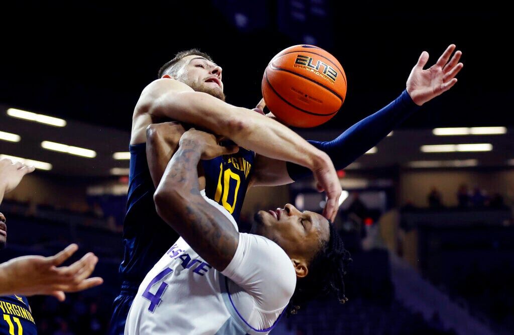 Louisville basketball court bringing back Dunking Cardinal - Sports  Illustrated