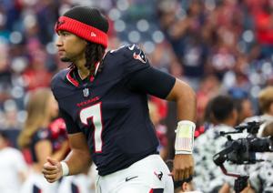 Aug 16, 2025; Houston, Texas, USA; Houston Texans quarterback C.J. Stroud (7) runs out of the tunnel onto the field before playing against the Carolina Panthers at NRG Stadium. Mandatory Credit: Thomas Shea-Imagn Images