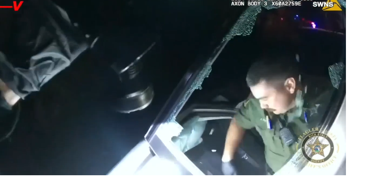 Bodycam video shows Florida deputies rescuing woman and baby from ...