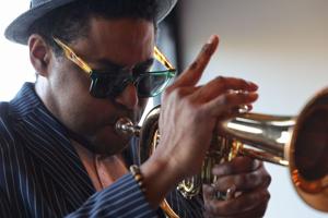 Trumpeter Kasimu Taylor performs at Tree House in Tower Grove South