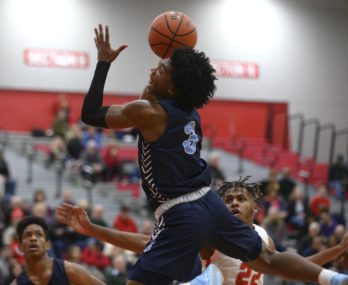 Stacker Brown Carry Belleville East Past Alton Boys Basketball