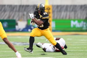 Oct 11, 2025; Columbia, Missouri, USA; Missouri Tigers running back Ahmad Hardy (29) runs the ball against the Alabama Crimson Tide during the first quarter at Faurot Field at Memorial Stadium. Mandatory Credit: Reese Strickland-Imagn Images