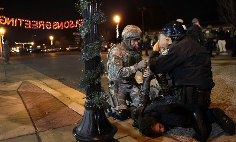 Communist activists rally, arrests made in Ferguson