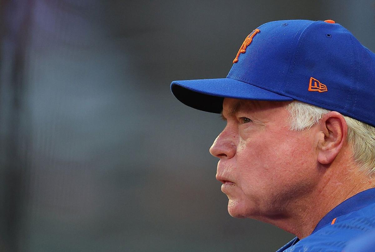 New York Mets manager Buck Showalter looks on from the dugout in the second inning against the Atlanta Braves at Truist Park on Aug. 15, 2022 in Atlanta.
