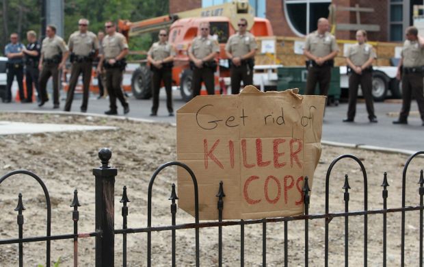 People protest the shooting of Michael Brown