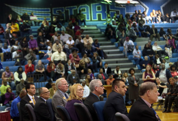 Parents protest the suspension of Superintendent Art McCoy