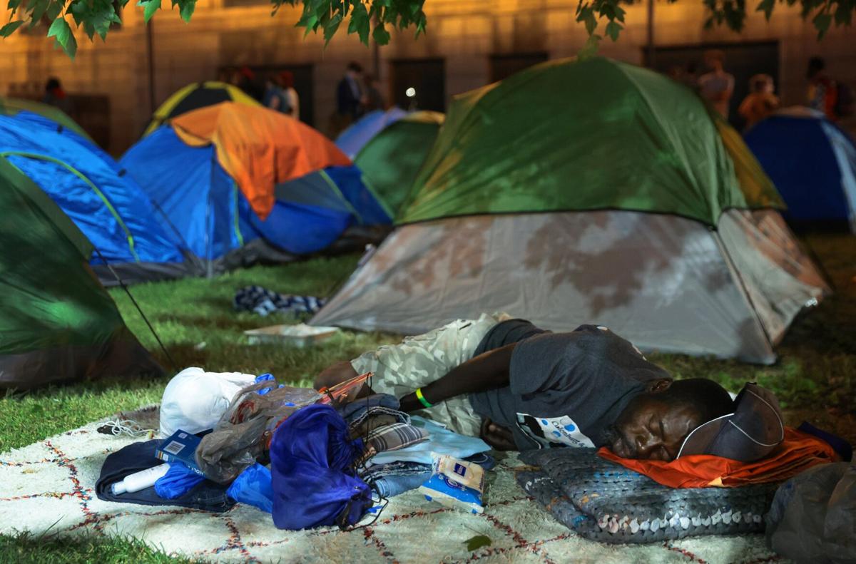 City Hall tent camp, threatened with closure, survives the night