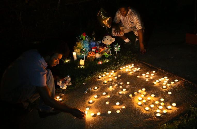 Vigil held for Mansur Ball-Bey, killed by police