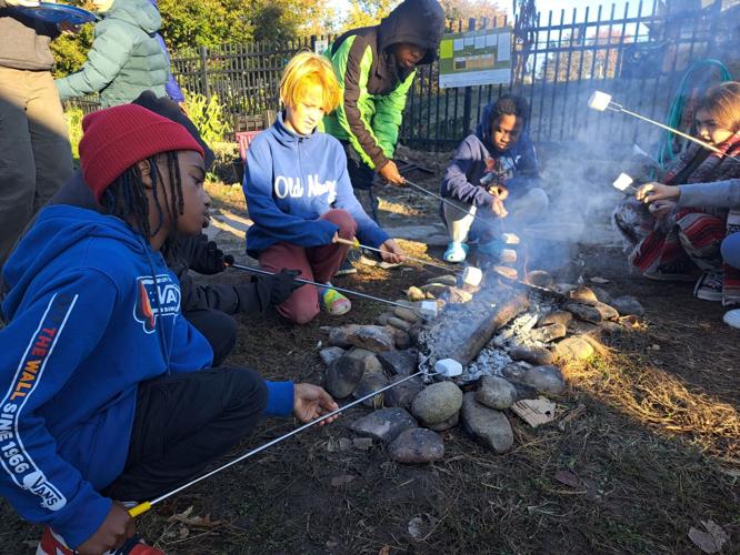 Students in Richmond Heights show off displays for wildlife, camping