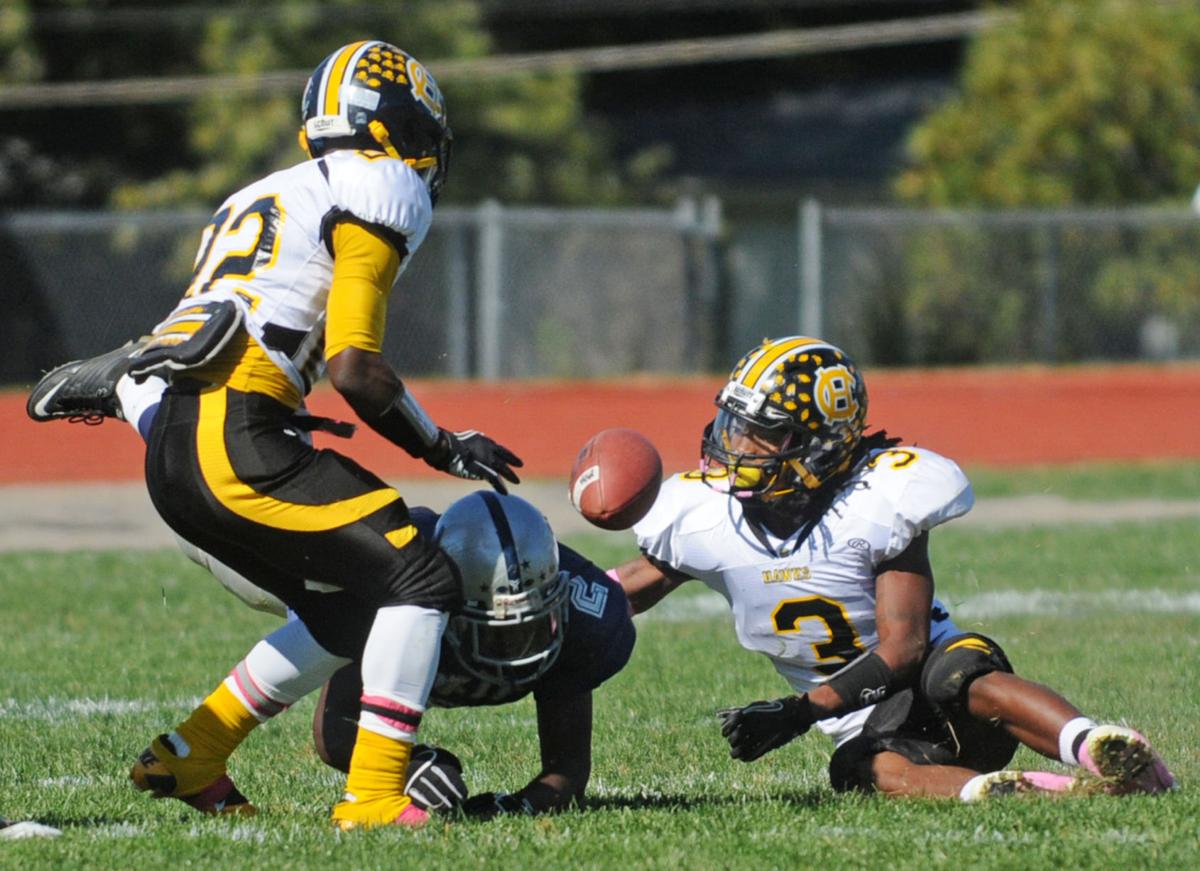 NORTH FOOTBALL ROUNDUP: Hawks clinch playoff spot with win over Huskies