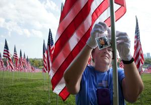 Flags of Valor memorial covers Art Hill in Forest Park
