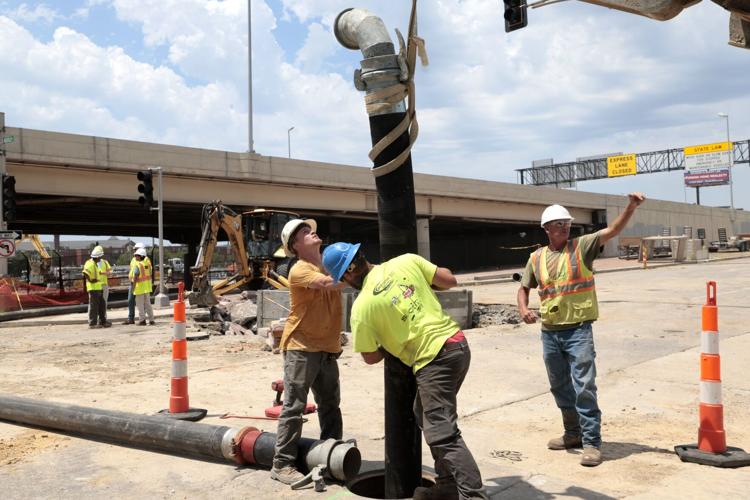 Crews continue to work on sinkhole repairs