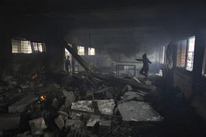 Israeli airstrike kills 10 people, half of them children, as mediators try to restart a ceasefire