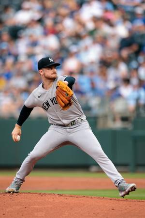 Jun 11, 2025; Kansas City, Missouri, USA; New York Yankees pitcher Clarke Schmidt (36) pitches during the first inning against the Kansas City Royals at Kauffman Stadium. Mandatory Credit: William Purnell-Imagn Images