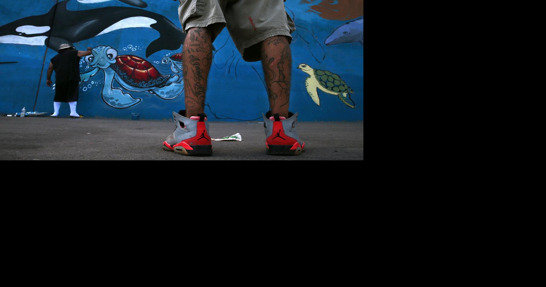 Fish mural on riverfront provides bridge from taggers to artists