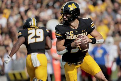 Missouri wins Border War! Beats Kansas 42-31