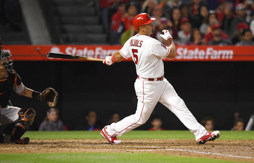 Pujols hits a trio of homers in World Series 