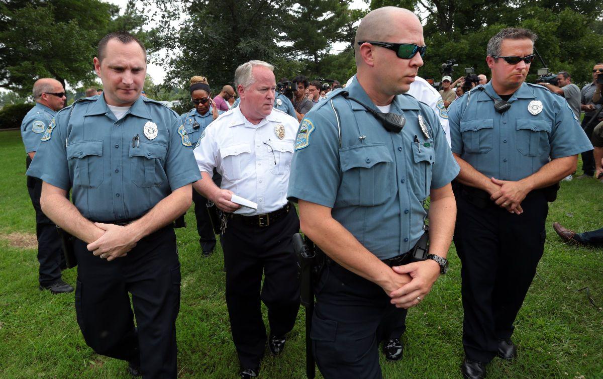 Ferguson police chief answers questions under heightened security