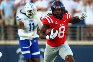 Aug 30, 2025; Oxford, Mississippi, USA; Mississippi Rebels tight end Dae'Quan Wright (8) runs after a catch during the first quarter against the Georgia State Panthers at Vaught-Hemingway Stadium. Mandatory Credit: Petre Thomas-Imagn Images