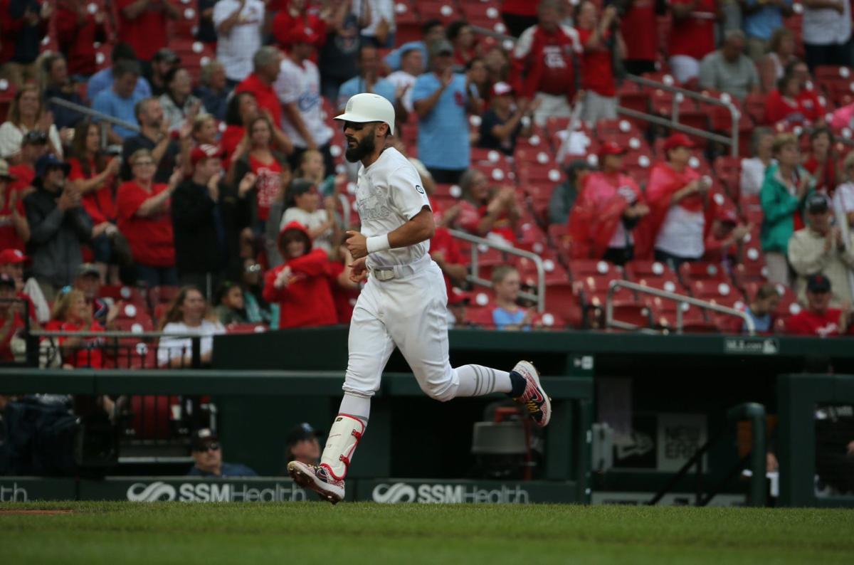 MILWAUKEE, WI - SEPTEMBER 21: St. Louis Cardinals center fielder Harrison  Bader (48) runs off the field during a game between the Milwaukee Brewers  and the St Louis Cardinals at American Family