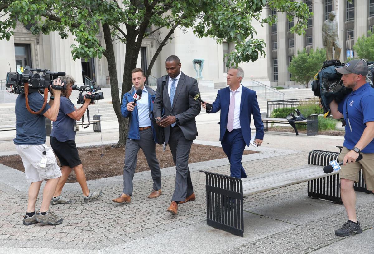 Attorney Jermaine Wooten representing former FBI agent William Don Tisaby leaves court