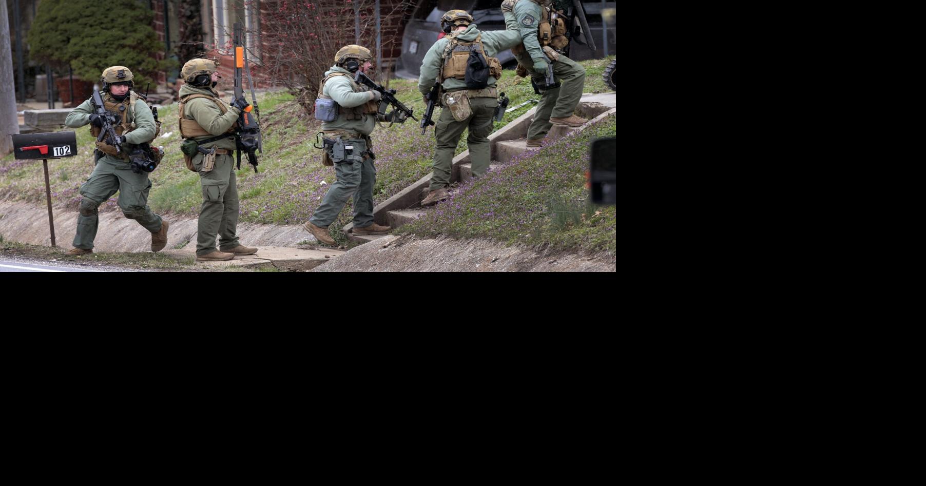 Standoff continues with man accused of shooting two Hermann police officers