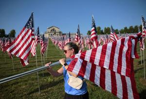 Flags of Valor memorial covers Art Hill in Forest Park