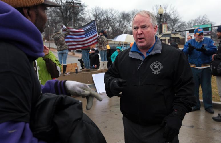 Police supporters, protesters, rally in Ferguson