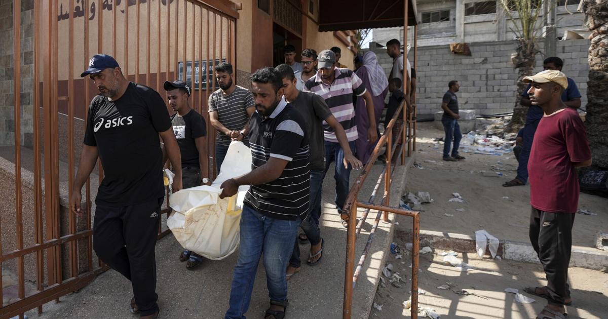 Israeli airstrikes hit UN school and homes in Gaza, killing at least 34 people, hospitals say