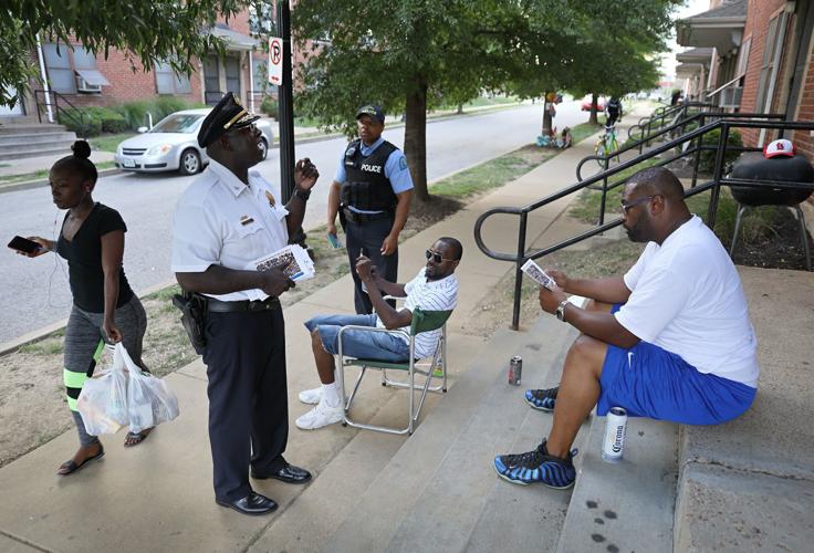 St. Louis police chief John Hayden walks Clinton-Peabody housing complex