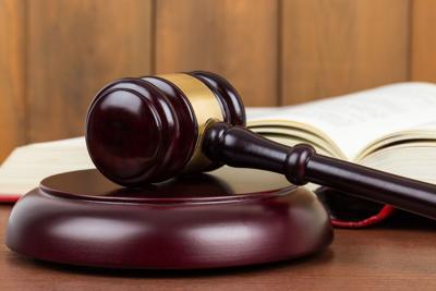 Wooden judge gavel and book