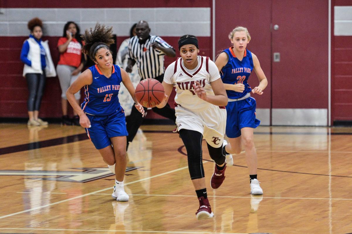 Smith Davis Combine To Help Trinity Hold Off Valley Park Girls